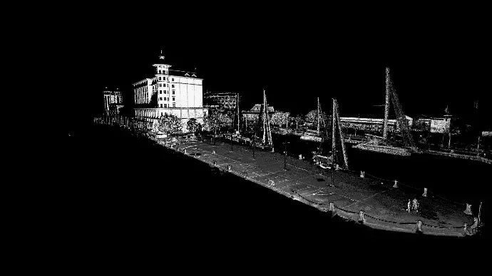Intensity-shaded point cloud of the Caudan Waterfront quay, showing the quay deck, bollards, moored yachts and the buildings behind